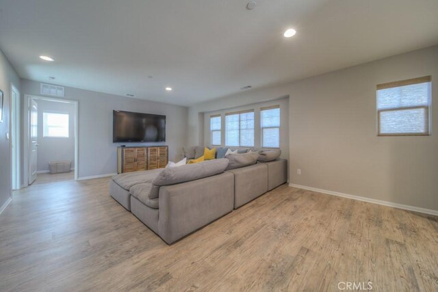 32593 Cumulus Ln, Winchester, CA 92596 - living area featuring baseboards, wood finished floors, and recessed lighting