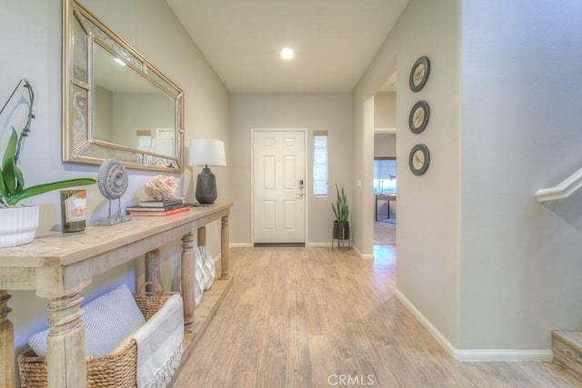 32593 Cumulus Ln, Winchester, CA 92596 - foyer with light wood-style flooring, baseboards, stairway, and recessed lighting