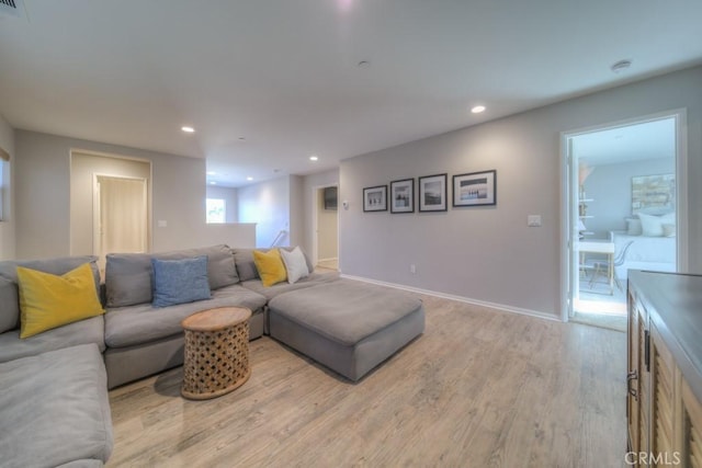 32593 Cumulus Ln, Winchester, CA 92596 - living room featuring light wood-type flooring, recessed lighting, and baseboards