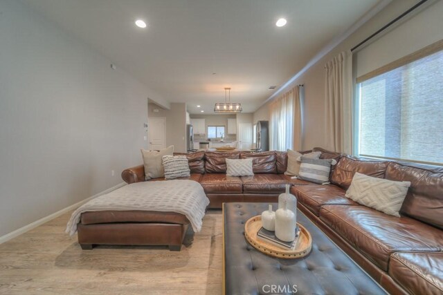 32593 Cumulus Ln, Winchester, CA 92596 - living area with wood finished floors, recessed lighting, baseboards, and a chandelier