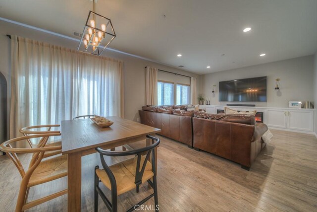 32593 Cumulus Ln, Winchester, CA 92596 - dining room with light wood-type flooring, recessed lighting, and a chandelier