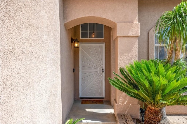 13492 Palomino Creek Dr, Corona, CA 92883 - view of exterior entry with stucco siding