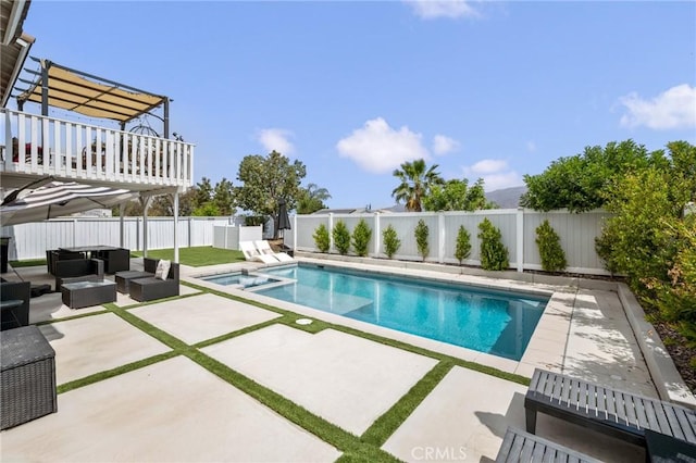 13492 Palomino Creek Dr, Corona, CA 92883 - view of pool featuring an outdoor living space, a fenced backyard, a patio, and a pool with connected hot tub