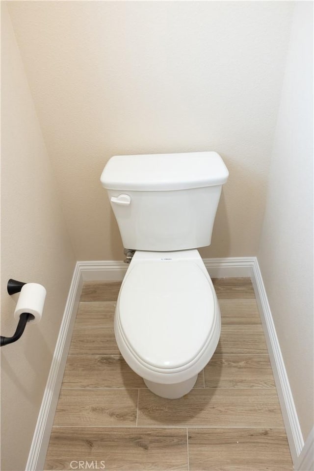 15640 Cheyenne Rd, Apple Valley, CA 92307 - bathroom featuring toilet and wood finished floors