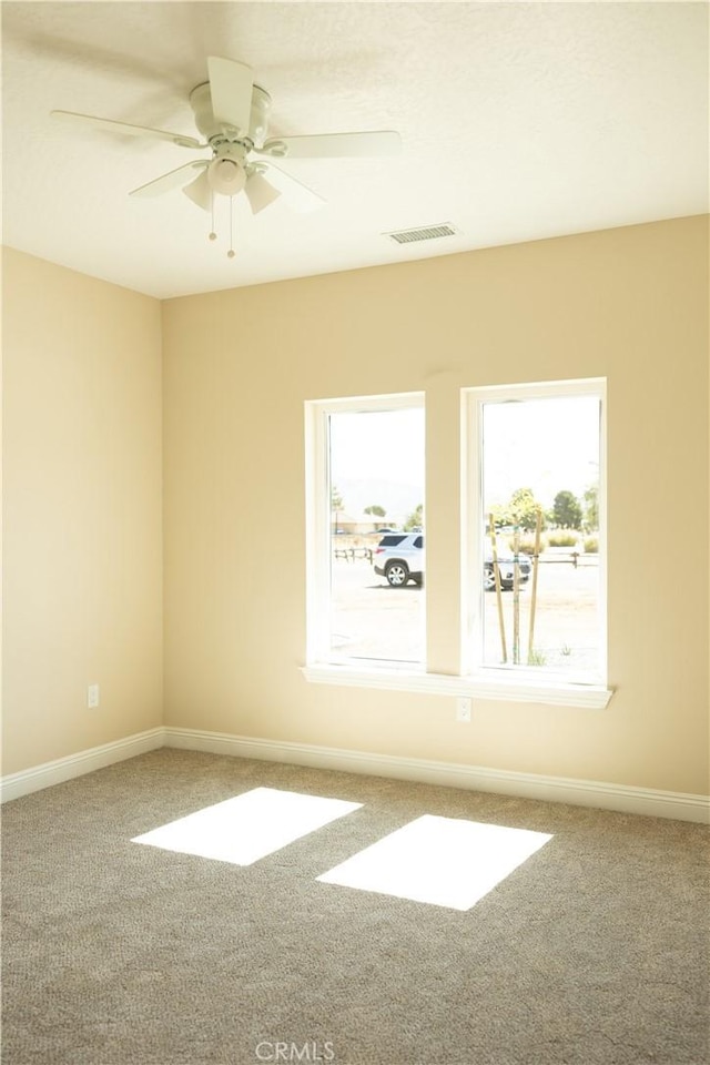 15640 Cheyenne Rd, Apple Valley, CA 92307 - carpeted empty room with baseboards and ceiling fan