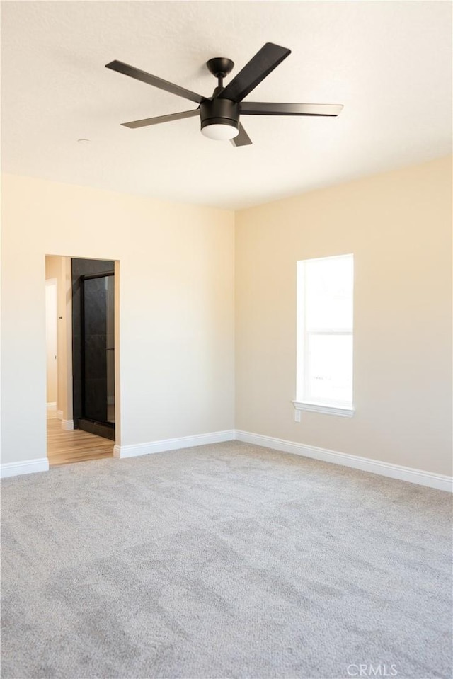15640 Cheyenne Rd, Apple Valley, CA 92307 - unfurnished room with light carpet and ceiling fan
