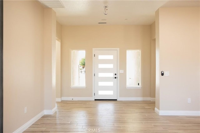 15640 Cheyenne Rd, Apple Valley, CA 92307 - entryway with light wood finished floors