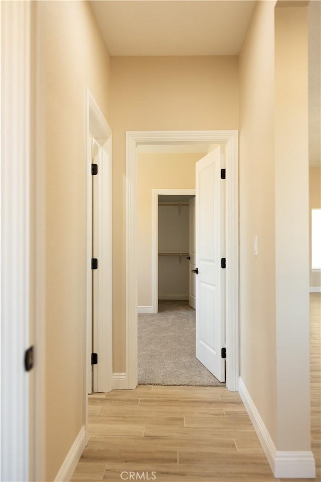 15640 Cheyenne Rd, Apple Valley, CA 92307 - hallway with light wood finished floors and baseboards
