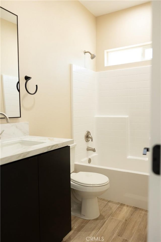 15640 Cheyenne Rd, Apple Valley, CA 92307 - full bathroom with vanity, shower / bathtub combination, and wood finished floors