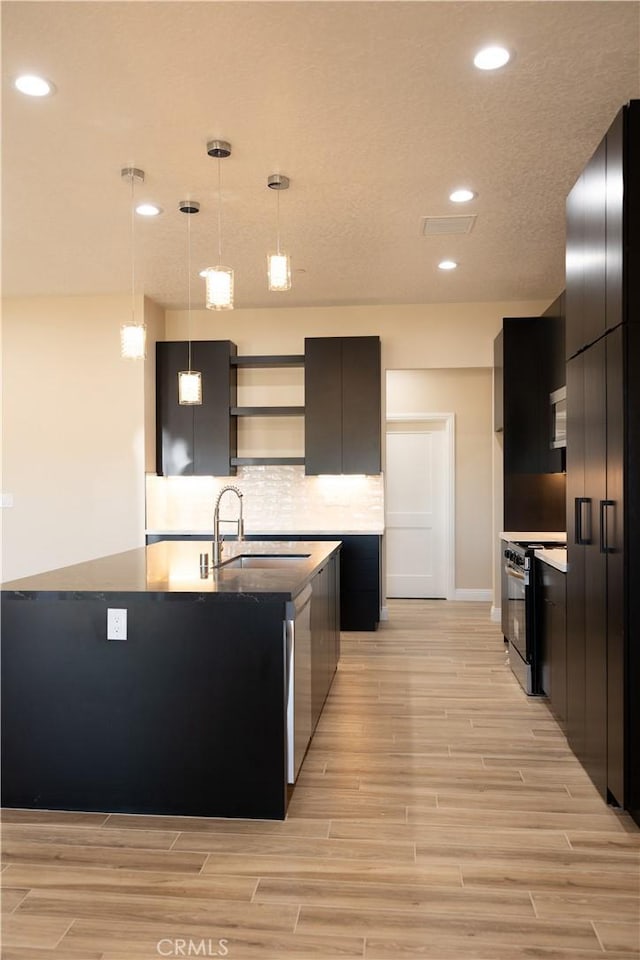 15640 Cheyenne Rd, Apple Valley, CA 92307 - kitchen with black range with electric cooktop, modern cabinets, open shelves, light wood-type flooring, and recessed lighting