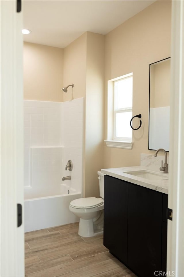 15640 Cheyenne Rd, Apple Valley, CA 92307 - full bath with vanity, shower / bathtub combination, and wood finished floors