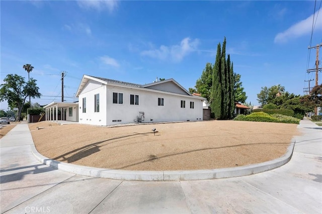 8245 Shoup Ave, West Hills, CA 91304 - view of front of home featuring stucco siding