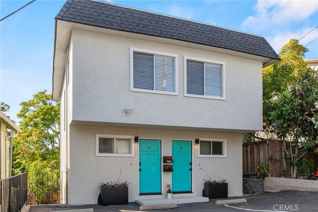 1022 Leff St, San Luis Obispo, CA 93401 - view of front of home with roof with shingles, mansard roof, and stucco siding