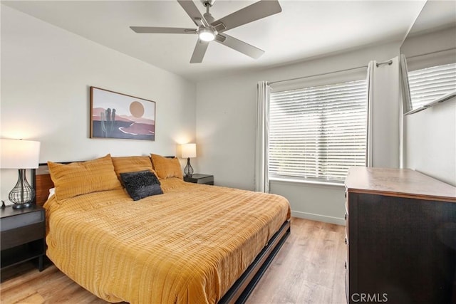 1022 Leff St, San Luis Obispo, CA 93401 - bedroom with light wood-type flooring, baseboards, and a ceiling fan