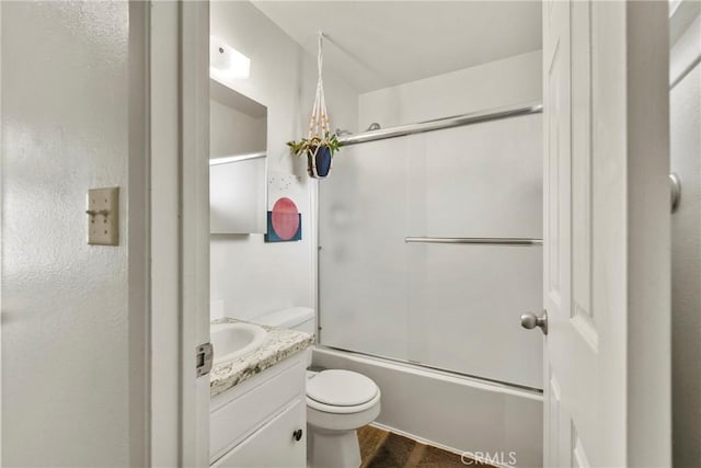 1022 Leff St, San Luis Obispo, CA 93401 - full bathroom with vanity, toilet, shower / bath combination with glass door, and wood finished floors