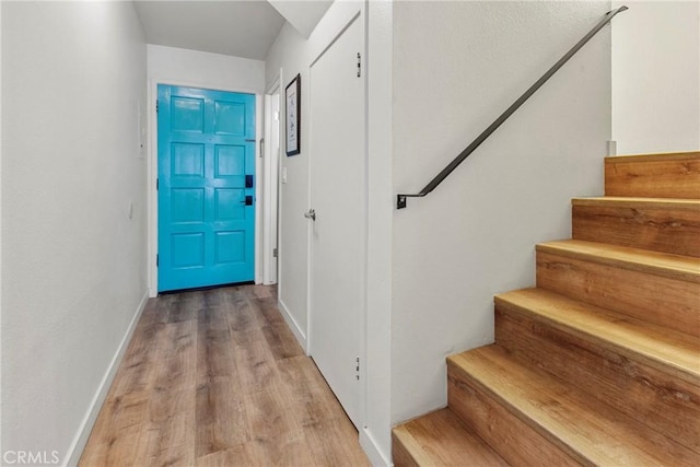 1022 Leff St, San Luis Obispo, CA 93401 - doorway to outside featuring stairs, light wood-type flooring, and baseboards