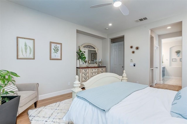 40365 Trenton Ct, Temecula, CA 92591 - bedroom featuring light wood-type flooring, recessed lighting, ensuite bath, and ceiling fan
