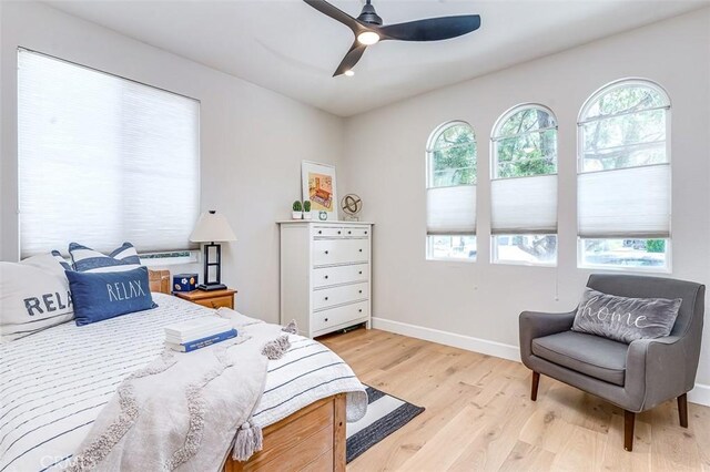40365 Trenton Ct, Temecula, CA 92591 - bedroom featuring multiple windows, light wood-type flooring, and ceiling fan