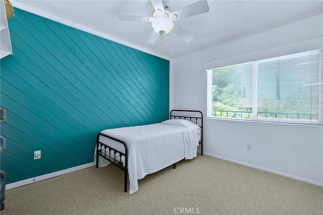 4527 Mockingbird Ln, Banning, CA 92220 - carpeted bedroom featuring baseboards and a ceiling fan