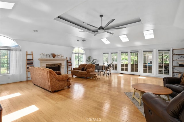 4527 Mockingbird Ln, Banning, CA 92220 - living area with a skylight, a raised ceiling, and a high end fireplace