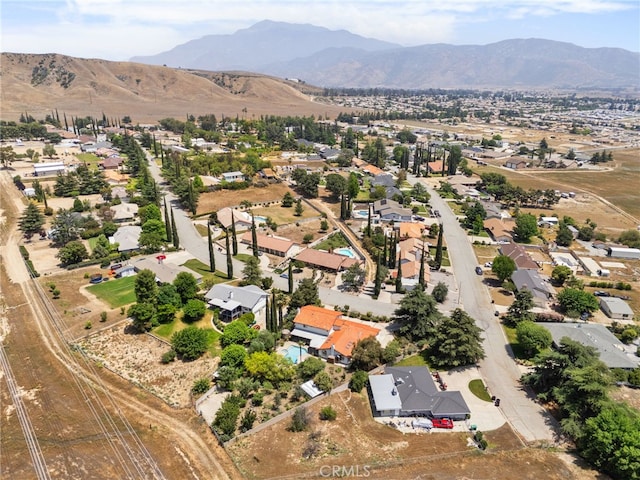 4527 Mockingbird Ln, Banning, CA 92220 - aerial view of property's location with a mountainous background and nearby suburban area