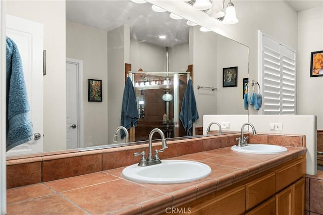 4802 Pentz Rd, Paradise, CA 95969 - full bathroom featuring double vanity and a shower stall