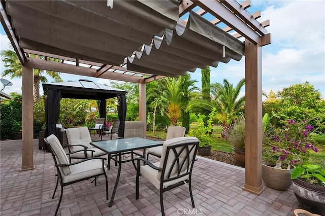 4802 Pentz Rd, Paradise, CA 95969 - view of patio featuring a gazebo, a pergola, and outdoor dining space
