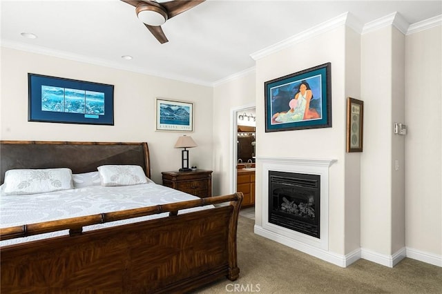 4802 Pentz Rd, Paradise, CA 95969 - bedroom featuring light colored carpet, crown molding, a fireplace, baseboards, and a ceiling fan