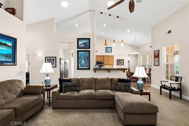 4802 Pentz Rd, Paradise, CA 95969 - living room with high vaulted ceiling, light carpet, a ceiling fan, and baseboards
