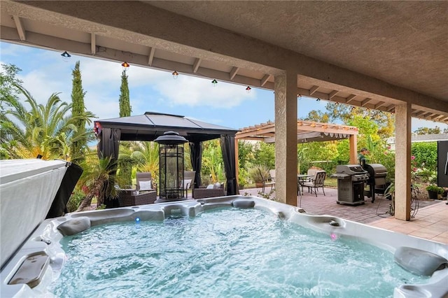 4802 Pentz Rd, Paradise, CA 95969 - view of patio with a gazebo, a hot tub, grilling area, and a pergola