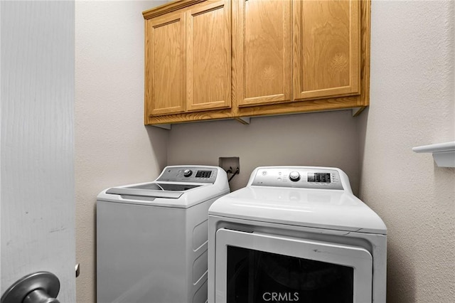 4802 Pentz Rd, Paradise, CA 95969 - laundry area with cabinet space and independent washer and dryer