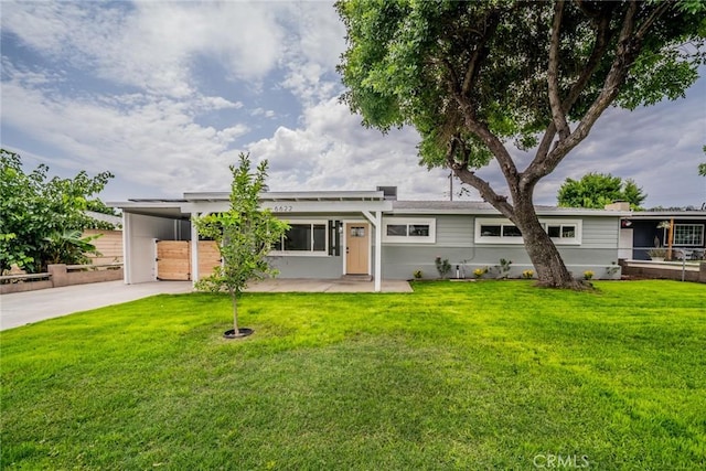 6622 Mitad Ct, San Bernardino, CA 92404 - view of front of property with an attached carport, a front lawn, and concrete driveway