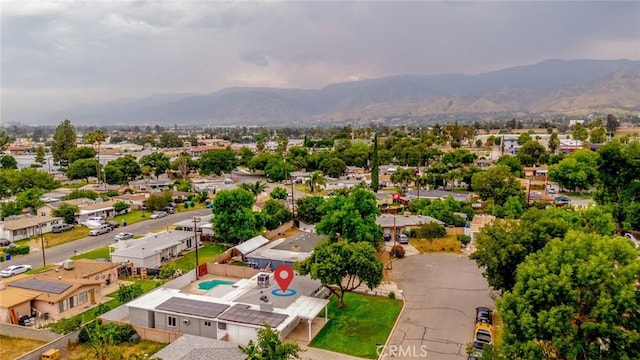 6622 Mitad Ct, San Bernardino, CA 92404 - aerial view of residential area featuring a mountain backdrop