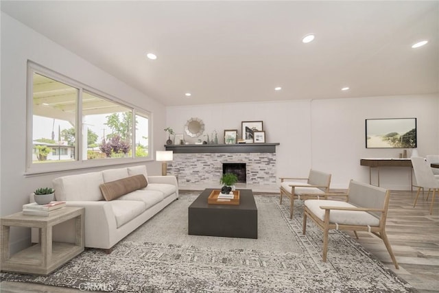 6622 Mitad Ct, San Bernardino, CA 92404 - living room featuring wood finished floors, recessed lighting, and a fireplace