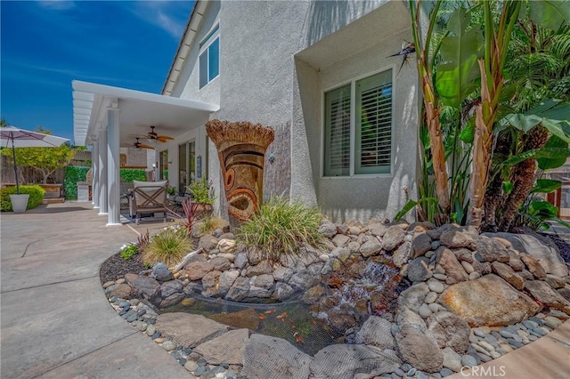 1122 Moonbeam Way, Turlock, CA 95382 - view of patio featuring a ceiling fan