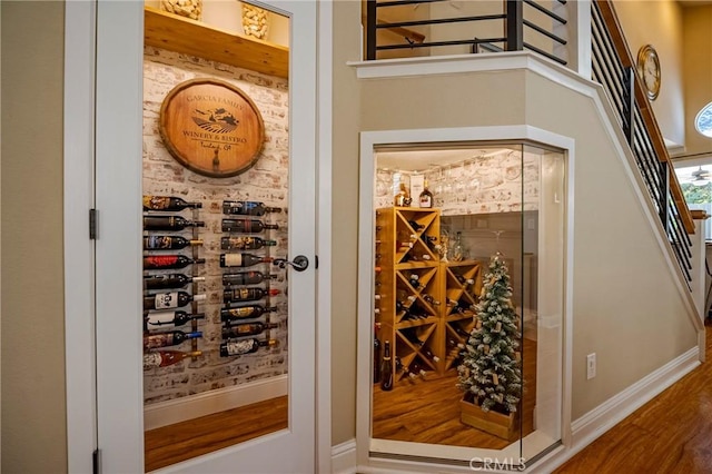 1122 Moonbeam Way, Turlock, CA 95382 - wine area featuring wood finished floors and baseboards