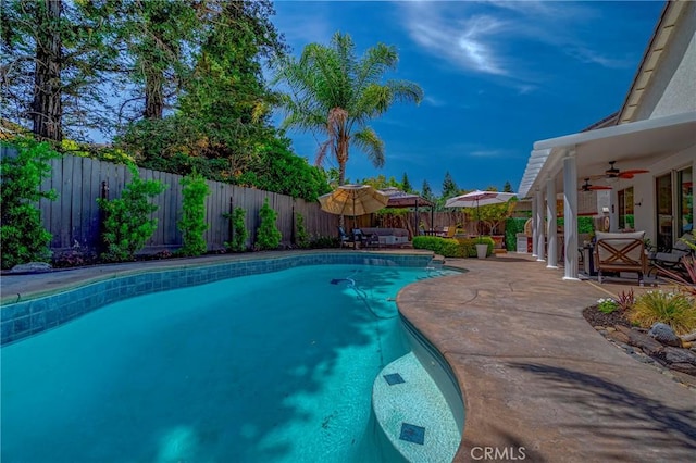 1122 Moonbeam Way, Turlock, CA 95382 - view of swimming pool featuring ceiling fan, a fenced backyard, and a patio