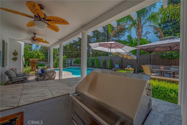 1122 Moonbeam Way, Turlock, CA 95382 - fenced backyard featuring a gazebo, outdoor dining area, a ceiling fan, and a patio