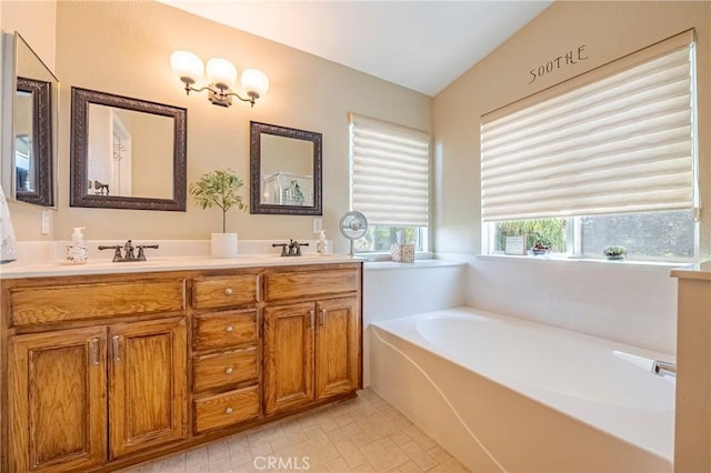 1122 Moonbeam Way, Turlock, CA 95382 - bathroom with a bath and double vanity