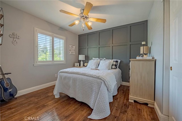1122 Moonbeam Way, Turlock, CA 95382 - bedroom featuring a decorative wall, wood finished floors, baseboards, and ceiling fan