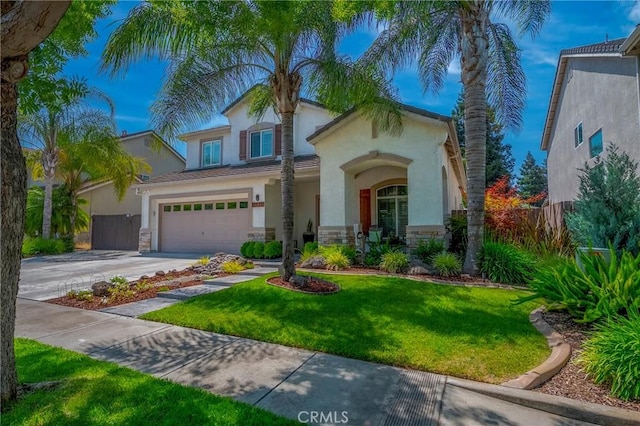 1122 Moonbeam Way, Turlock, CA 95382 - view of front facade with stucco siding, concrete driveway, stone siding, and a garage