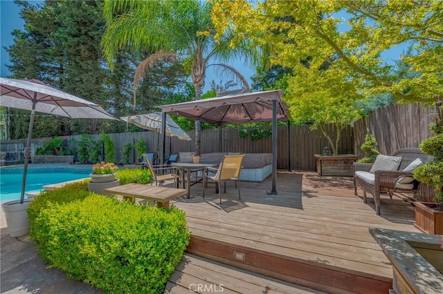 1122 Moonbeam Way, Turlock, CA 95382 - wooden terrace with a gazebo, a fenced backyard, and outdoor dining area