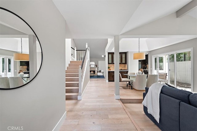 1890 Orange Ave, Costa Mesa, CA 92627 - living room with light wood-style flooring and stairway