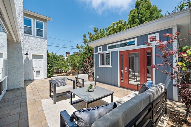 1890 Orange Ave, Costa Mesa, CA 92627 - view of patio / terrace featuring an outdoor structure and an outdoor living space