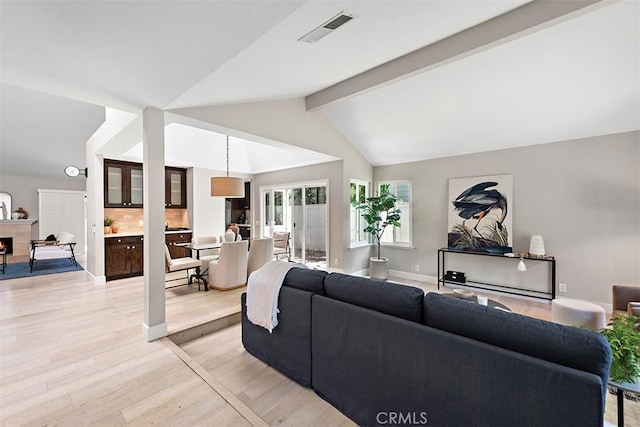 1890 Orange Ave, Costa Mesa, CA 92627 - living room featuring light wood-style flooring and baseboards