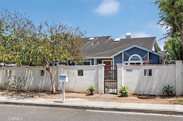 1890 Orange Ave, Costa Mesa, CA 92627 - view of front of property featuring a fenced front yard, a shingled roof, and a gate