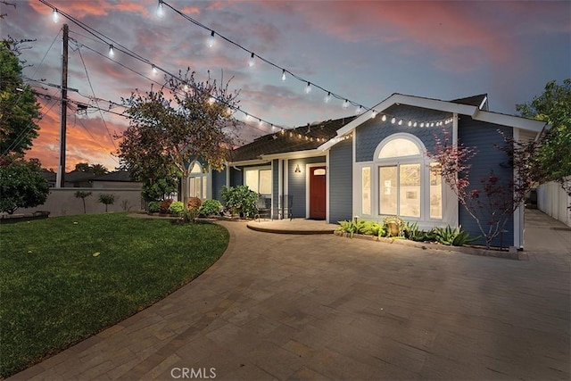 1890 Orange Ave, Costa Mesa, CA 92627 - ranch-style home with a lawn