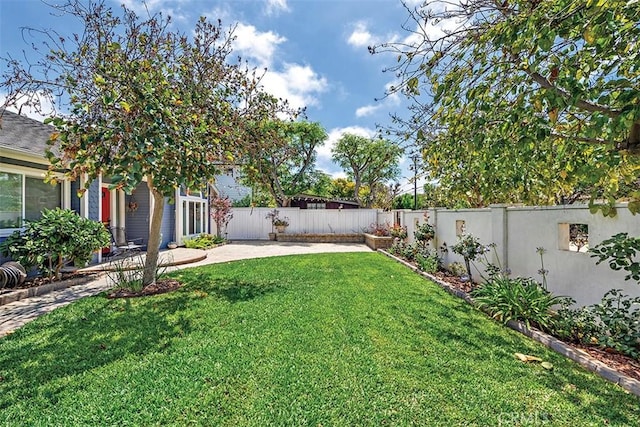1890 Orange Ave, Costa Mesa, CA 92627 - fenced backyard with a patio area