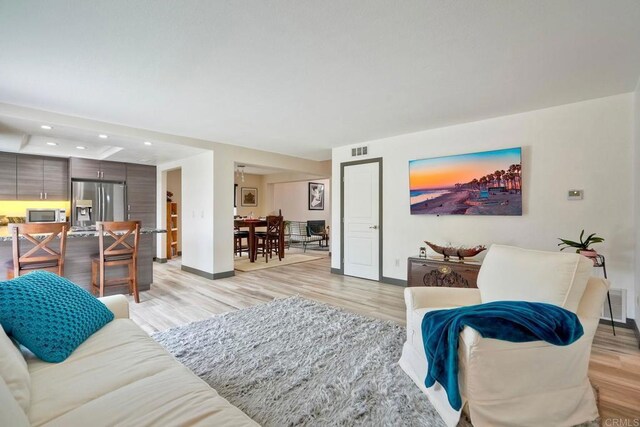 3332 Heather Ridge Ct, San Marcos, CA 92078 - living room featuring light wood-style flooring, baseboards, and recessed lighting