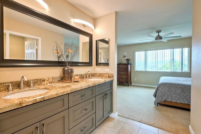 3332 Heather Ridge Ct, San Marcos, CA 92078 - ensuite bathroom featuring double vanity, baseboards, tile patterned flooring, and ceiling fan